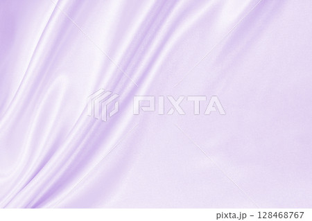 Smooth elegant lilac silk or satin texture as wedding background. Luxurious valentine day background design 128468767