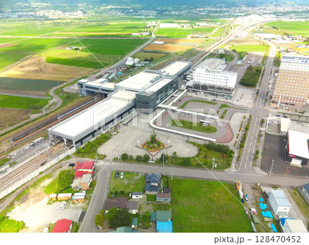 夏の北海道北斗市で新函館北斗駅の風景を空撮 128470452