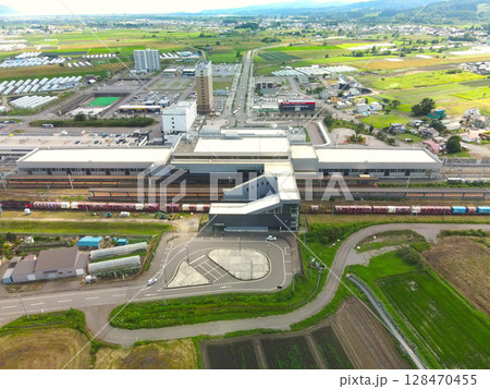 夏の北海道北斗市で新函館北斗駅の風景を空撮 夏の北海道北斗市で新函館北斗駅の風景を空撮 128470455