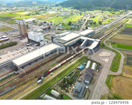 夏の北海道北斗市で新函館北斗駅の風景を空撮 夏の北海道北斗市で新函館北斗駅の風景を空撮 128470456