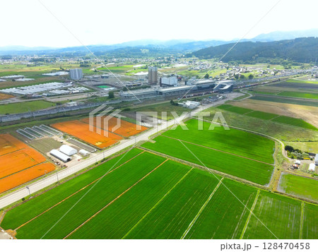 夏の北海道北斗市で新函館北斗駅の風景を空撮 夏の北海道北斗市で新函館北斗駅の風景を空撮 128470458