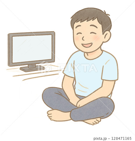 テレビを見ながら笑顔でくつろぐ子ども、自宅でリラックスする少年の穏やかな時間、テレビの前で楽しそうに 128471165