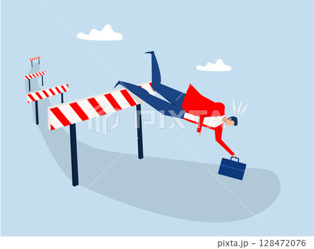 Businessman Failing to Jump Hurdle and Falling to the Ground,failure, mistake or cannot overcome difficulty or obstacle, problem or underperform employee concept. 128472076