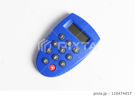 Blue internet banking token used to generate password for online transactions, isolated on white. Blue internet banking token used to generate password for online transactions, isolated on white. 128474857