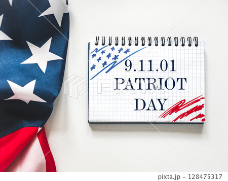 Patriot Day. American flag and lettering Patriot Day. American flag and lettering 128475317