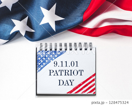 Patriot Day. American flag and lettering Patriot Day. American flag and lettering 128475324