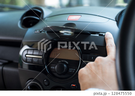 Modern car radio and CD player Modern car radio and CD player 128475550