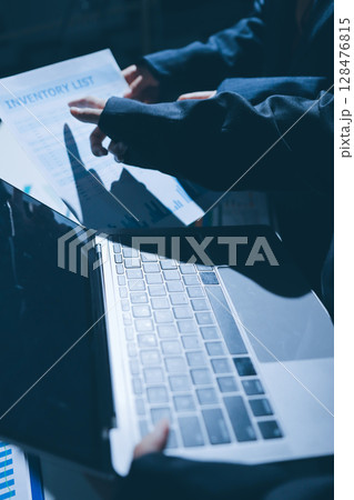 Two business people analyzing the data 128476815
