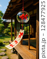 風に揺れる金魚の風鈴 128477925