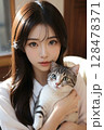 猫を抱く清楚な美しい女性 128478371