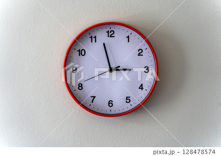 Round Wall Clock on Light Minimal Background 128478574