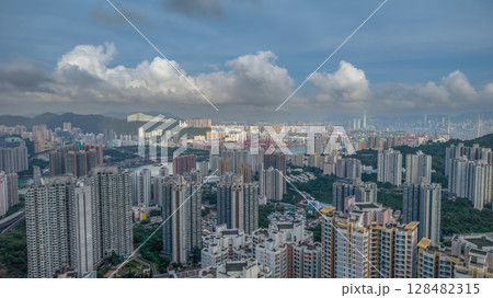 July 13 2025 Residential Towers Overlooking Green Hills and Urban Cityscapes 128482315