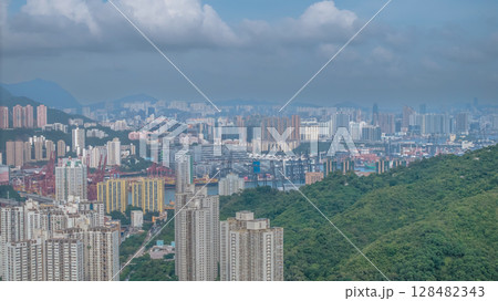 July 13 2025 Residential Towers Overlooking Green Hills and Urban Cityscapes 128482343