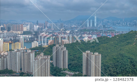 July 13 2025 Residential Towers Overlooking Green Hills and Urban Cityscapes 128482378