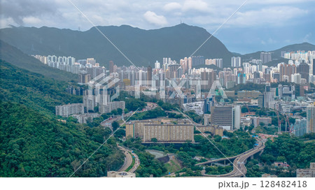 July 12 2025 Urban Skyline with Lush Forested Hills and Mountain Backdrop July 12 2025 Urban Skyline with Lush Forested Hills and Mountain Backdrop 128482418