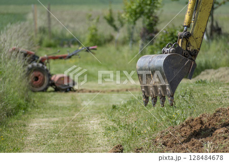 Earthworks, exterior works with machinery 128484678