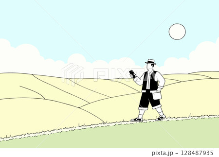 Man with Mobile Phone in Rural Landscape 128487935