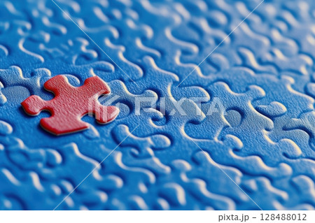 One piece detail of puzzle is red on blue puzzle background. Different concept. Puzzle pieces grid, Jigsaw blue colour. Success mosaic solution template. Symbol of business strategy, completing, team 128488012