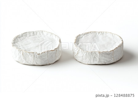 Camembert cheese isolated on white background with clipping path and full depth of field. Fresh whole, piece and sliced camembert. Set of big round French Brie cheeses with white mold.. Dairy product. 128488875