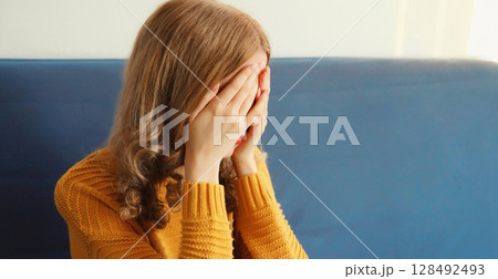 Upset sad crying woman while experiencing mental suffering, depression, fatigue, emotional stress Upset sad crying woman while experiencing mental suffering, depression, fatigue, emotional stress 128492493