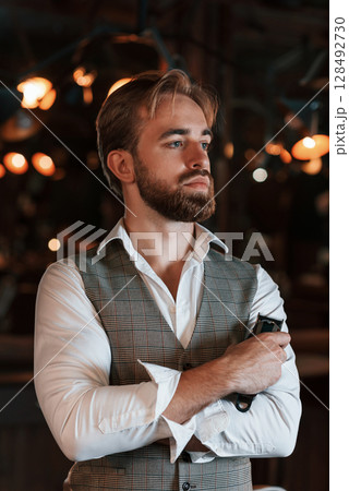 Handsome barber is in the salon Handsome barber is in the salon 128492730