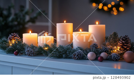 Cozy Christmas candles with pine cones and festive decor, evening ambiance. Holiday season mood concept 128493902