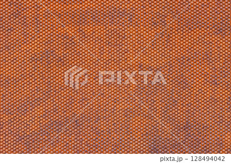 rusted steel sheet texture with embossed spherical indentations pattern 128494042