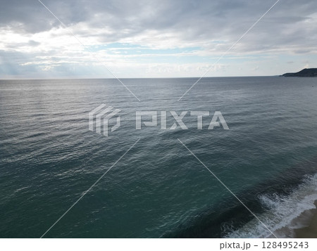 Sunset ocean waves. Sunset ocean horizon. High quality 4k footage 128495243