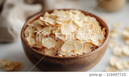 Vibrant paint palette with brushes and drawings amidst cheerful childrens activities 128497720