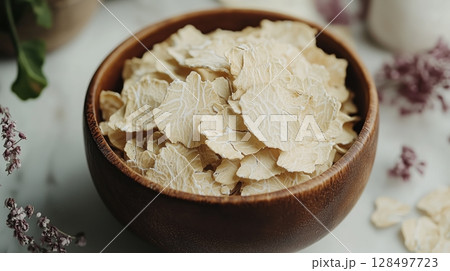 Vibrant paint palette with brushes and drawings amidst cheerful childrens activities 128497723