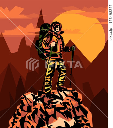 Man on the top of the mountain looks at the beautiful landscape of the mountains. 128498225