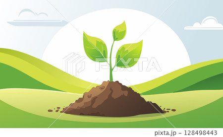 New life concept with a leaf sprout rising from the soil in a peaceful countryside scene. 128498443
