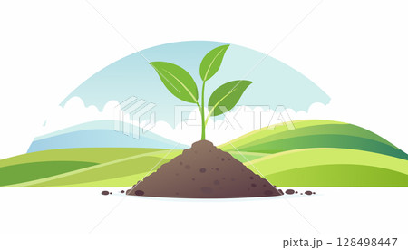 Small plant thriving in rich earth surrounded by natural hills and open blue sky. 128498447