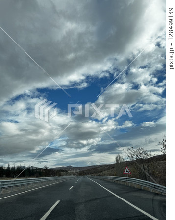 Cloudy road landscape. High quality photo Cloudy road landscape. High quality photo 128499139