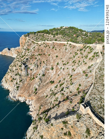 fortress on a rock near the sea coast 128499248