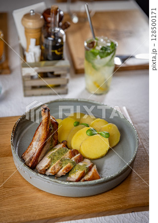 Sliced grilled pork chop Sliced grilled pork chop 128500171