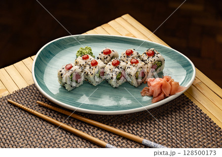 Uramaki sushi rolls with tuna Uramaki sushi rolls with tuna 128500173