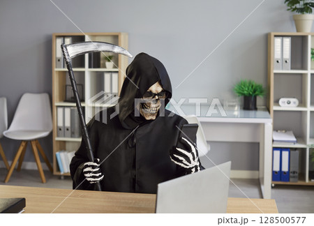 Mobile phone crime, Grim Reaper of Death finding new victim online, Internet scam cybercrime fraud 128500577