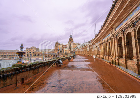 Sevilla Plaza de Espana Fountain in Spring Rainy Dusk. Sevilla Plaza de Espana Fountain in Spring Rainy Dusk. 128502999