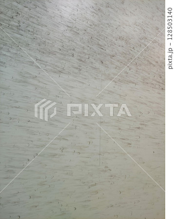 Gray textured wall creates modern background squash, copy space 128503140