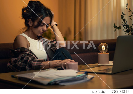 beautiful graphic designer woman working at home office remotely using digital graphic tablet and laptop 128503815