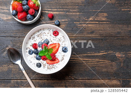 Overnight chia bowl with yogurt and fresh berries Overnight chia bowl with yogurt and fresh berries 128505442