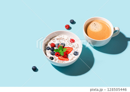 Chia bowl with yogurt and berries on blue 128505446