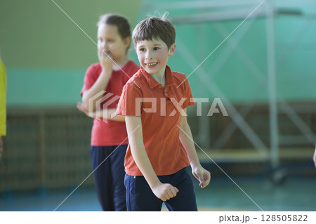 Little boy in a red T-shirt in the gym. Little boy in a red T-shirt in the gym. 128505822