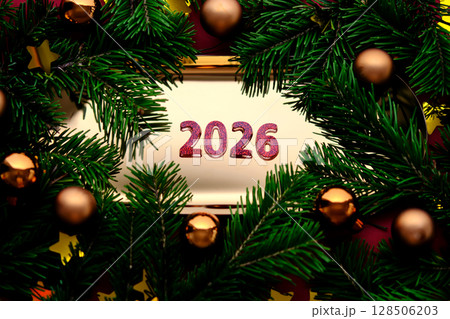 Golden New Year's background with the number of the coming year 2026. 128506203