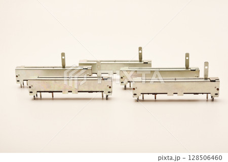 Slider potentiometers. Variable resistors. Devices for voltage changes. 128506460