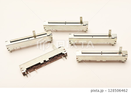 Slider potentiometers. Variable resistors. Devices for voltage changes. 128506462