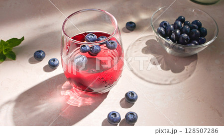 glass of red drink glass of red drink 128507286