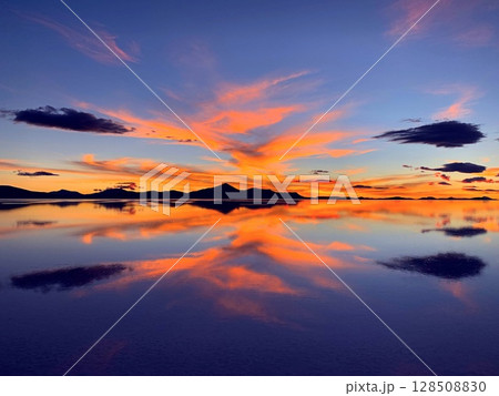 Orange sunset clouds Orange sunset clouds 128508830