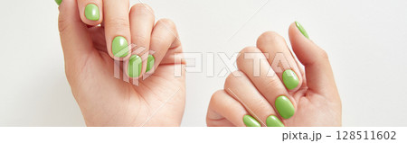 Beautiful womans hands with summer nail design on white background. 128511602